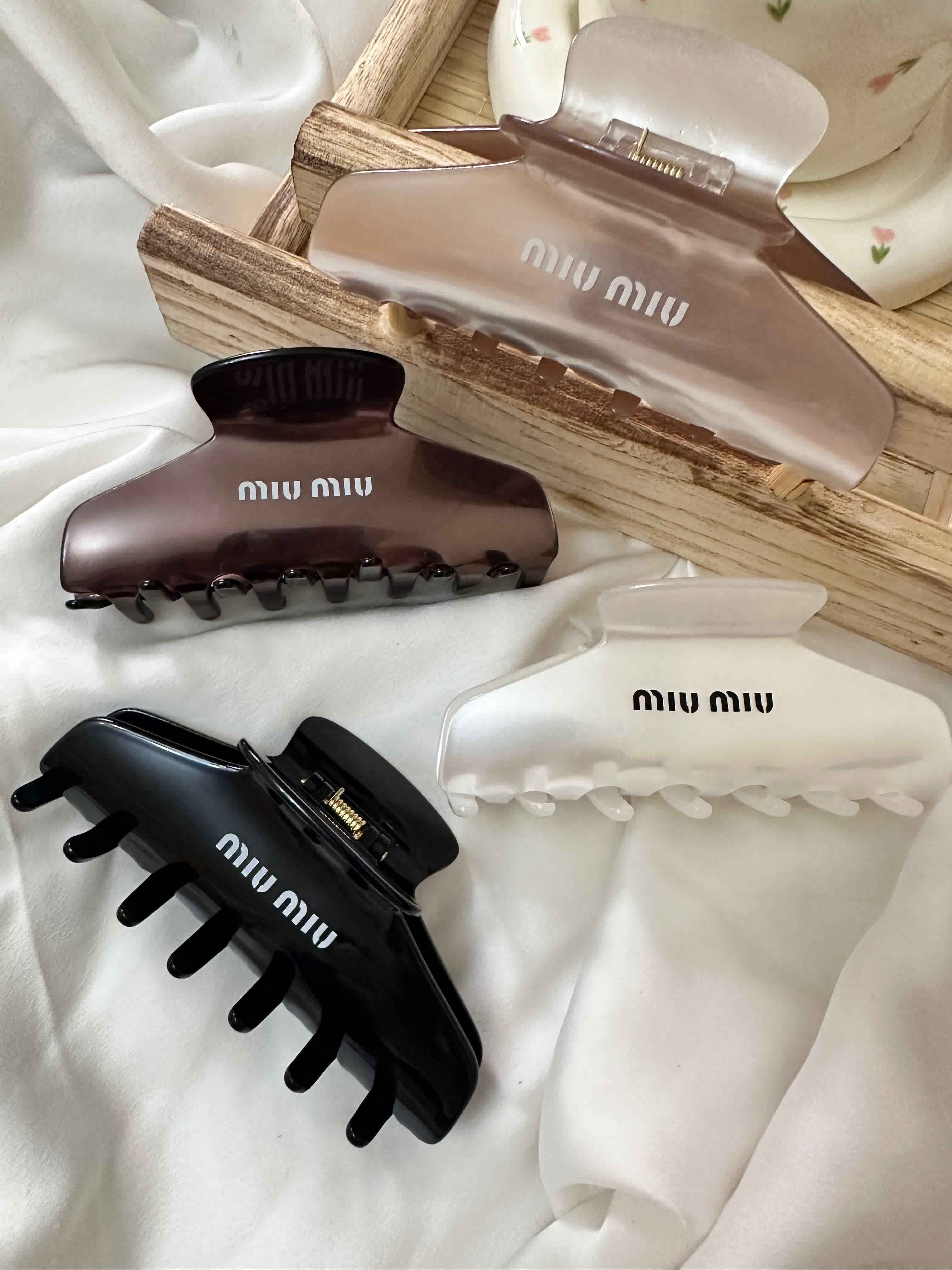 Attache miumiu brillant